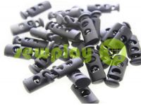 Fixator for cord d = 5mm plastic two-hole 9mm * 21mm black, 10 pcs sku 611