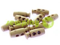 Fixator for cord d = 4mm plastic two-hole 9mm * 21mm beige, 10 pcs sku 613