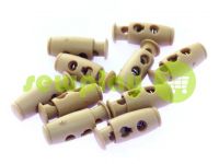 Fixator for cord d = 4mm plastic two-hole 9mm * 21mm beige, 10 pcs sku 613