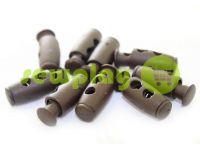 Fixator for cord d = 4mm plastic two-hole 9mm * 21mm brown, 10 pcs sku 614