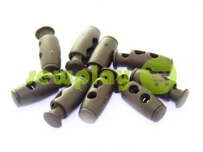 Fixator for cord d = 4mm plastic two-hole 9mm * 21mm brown, 10 pcs sku 614