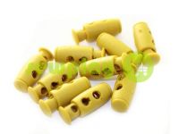 Fixator for cord d = 4mm plastic two-hole 9mm * 21mm mustard, 10 pcs sku 616