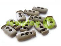 Fixator for cord d = 4mm plastic two-hole 12mm * 23mm brown, 10 pcs sku 619