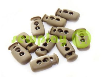 Fixator for cord d = 4mm plastic two-hole 12mm * 23mm brown, 10 pcs sku 619