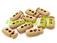 Fixator for cord d = 4mm plastic two-hole 12mm * 23mm beige, 10 pcs sku 620