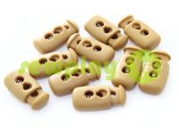 Fixator for cord d = 4mm plastic two-hole 12mm * 23mm beige, 10 pcs sku 620