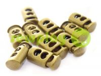 Fixator for cord d = 7mm plastic two-hole 12mm * 23mm antique, 10 pcs sku 627